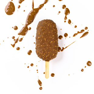 Вершкове морозиво на паличці в молочній глазурі гурме